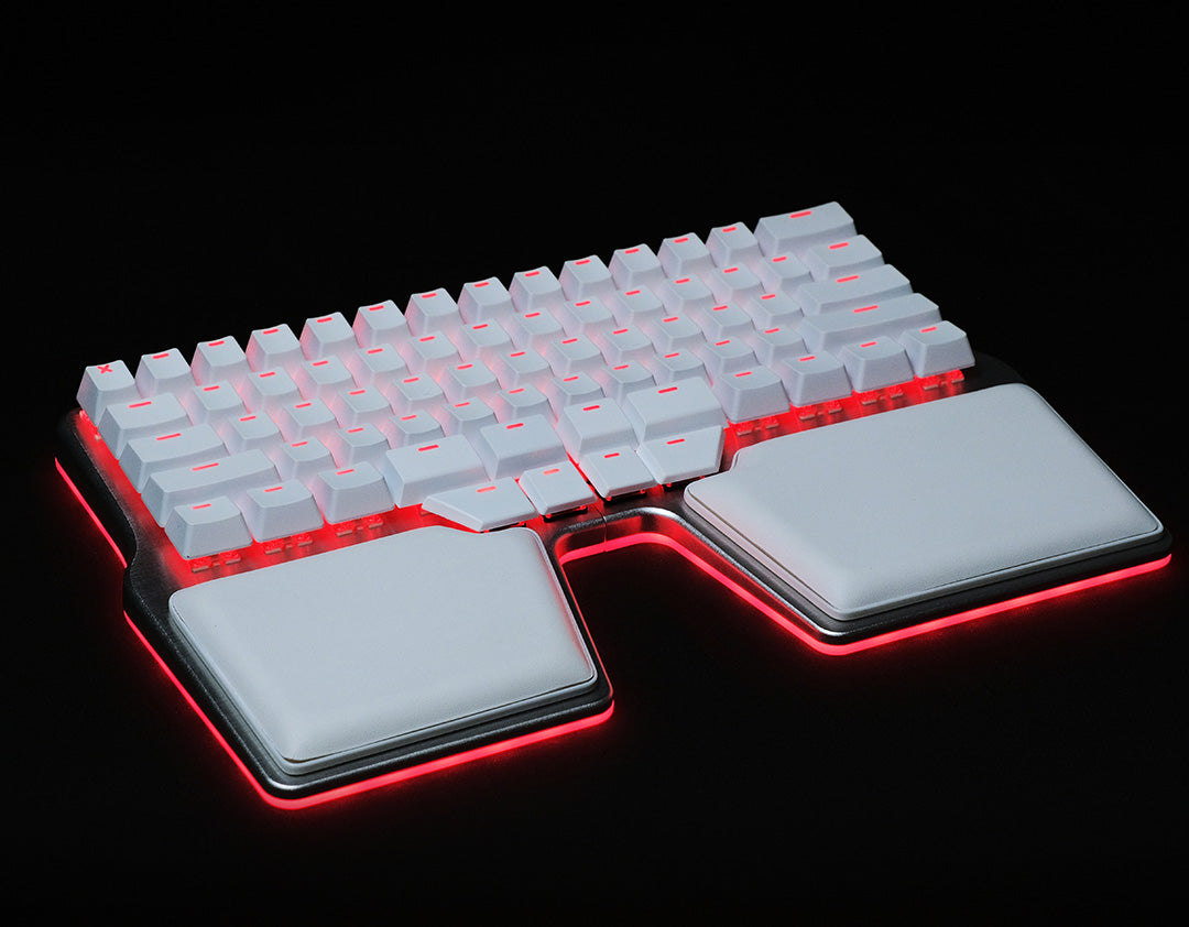 Image of the Raise 2 white key caps and white palm pads with a red under glow